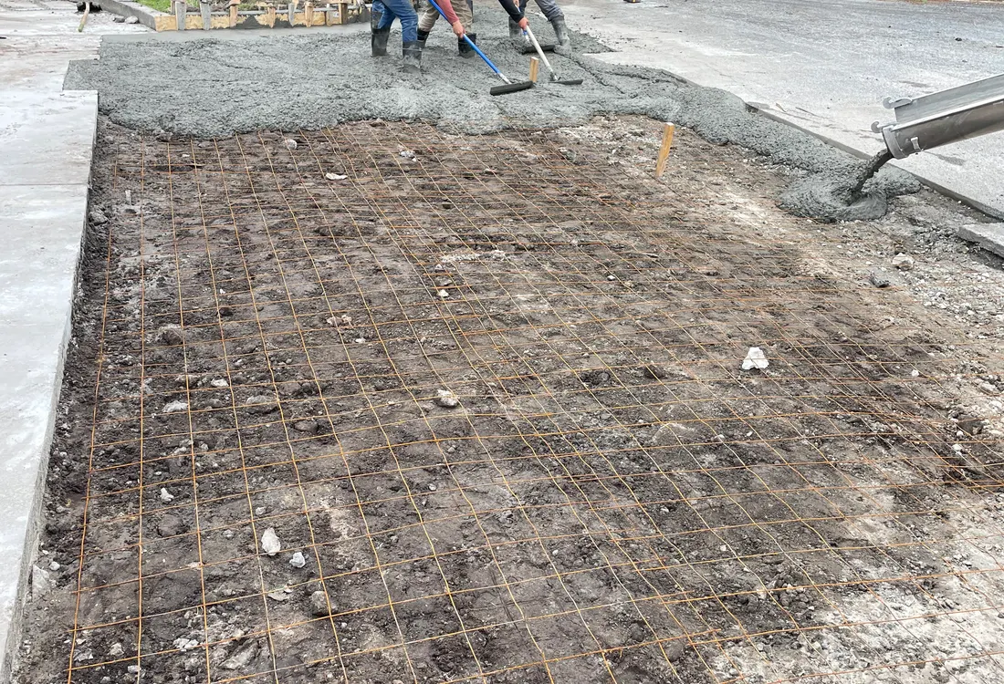 Old surface removed down to bare earth ready for the next phase